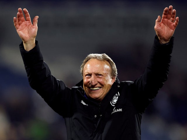 Huddersfield Town manager Neil Warnock celebrates after the match on May 4, 2023