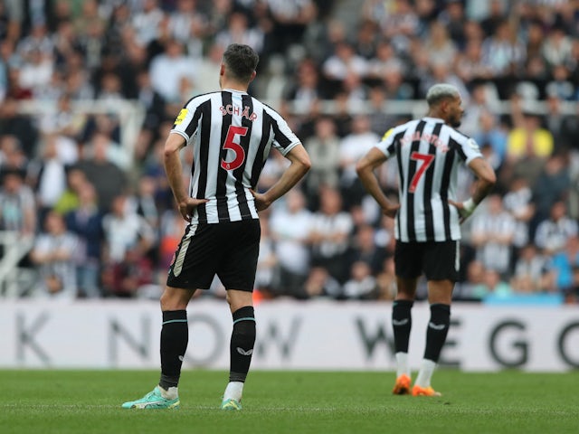 Newcastle players react after Fabian Schar scores an own goal on May 7, 2023