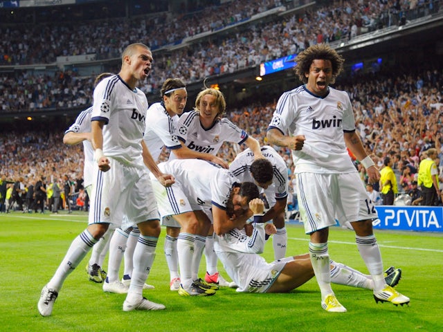 Real Madrid players celebrate Cristiano Ronaldo's goal against Manchester City on September 18, 2012