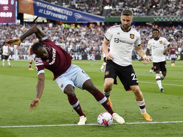 West Ham United's Michail Antonio in action with Manchester United's Luke Shaw on May 7, 2023