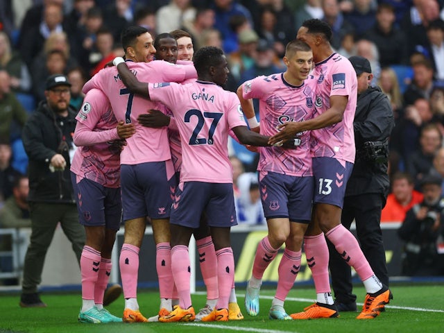 Everton's Abdoulaye Doucoure celebrates scoring their first goal with teammates on May 8, 2023