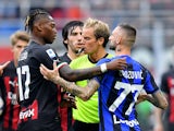 AC Milan's Rafael Leao clashes with Inter Milan's Marcelo Brozovic on September 3, 2022
