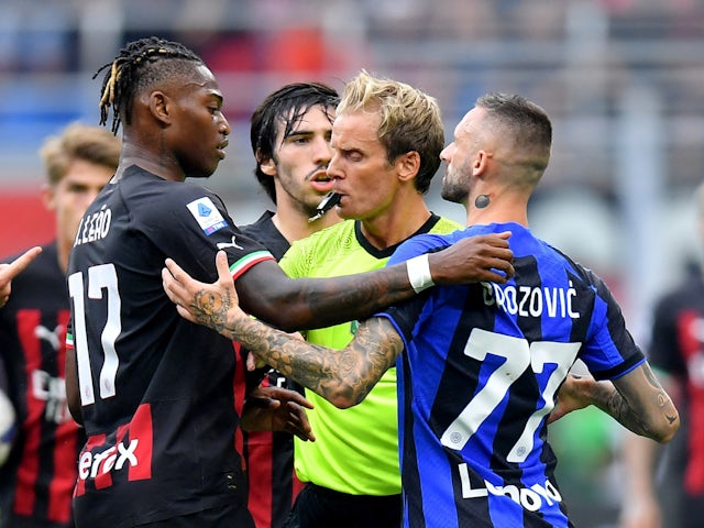 AC Milan's Rafael Leao clashes with Inter Milan's Marcelo Brozovic on September 3, 2022