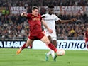 Roma's Andrea Belotti in action with Bayer Leverkusen's Odilon Kossounou on May 11, 2023