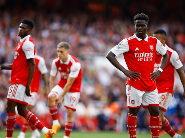 Arsenal players look dejected after Julio Enciso scores for Brighton & Hove Albion on May 14, 2023