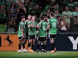 Austin FC players celebrate after a goal on May 10, 2023