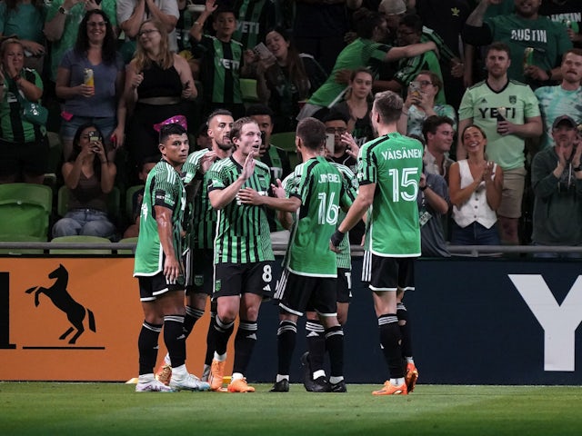 Austin FC players celebrate after a goal on May 10, 2023