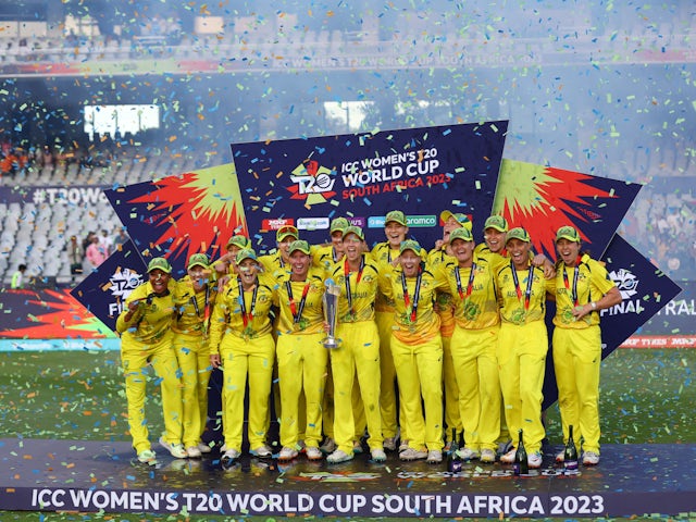 Australia's Meg Lanning celebrates with the trophy and teammates after winning the ICC Women's Cricket T20 World Cup on February 26, 2023