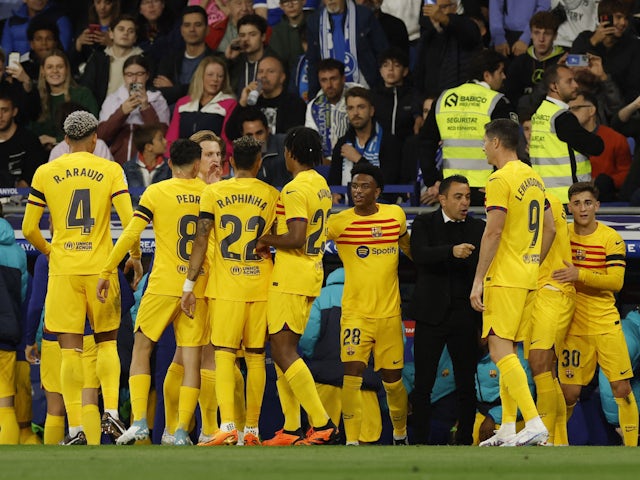 Barcelona's Alex Balde celebrates scoring their second goal with teammates on May 14, 2023