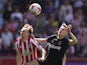 Brentford's Mikkel Damsgaard in action with West Ham United's Flynn Downes on May 14, 2023