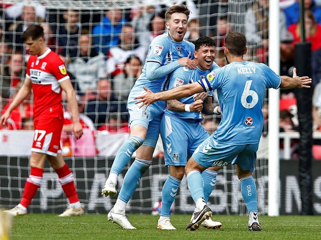 Coventry City's Gustavo Hamer celebrates with teammates after he scores their first goal on May 8, 2023