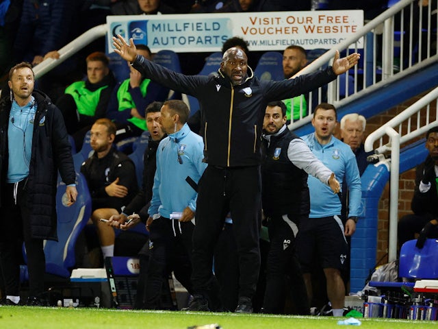 Sheffield Wednesday manager Darren Moore reacts on May 12, 2023