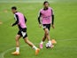  Benfica's David Neres and Cher Ndour during training on April 18, 2023