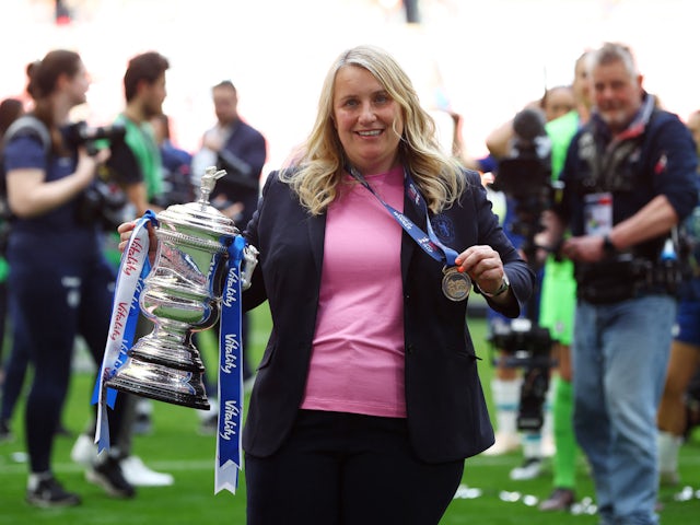 Chelsea Women manager Emma Hayes celebrates with the trophy after winning the Women's FA Cup on May 14, 2023