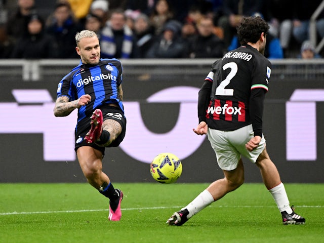 Inter Milan's Federico Dimarco in action with AC Milan's Davide Calabria on February 5, 2023