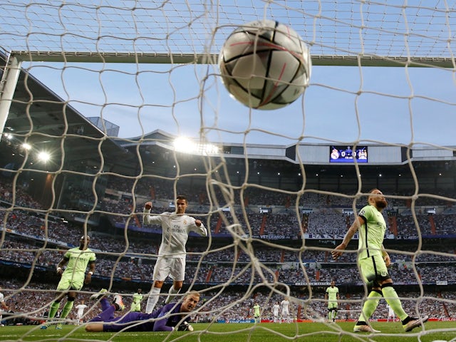 Manchester City's Fernando scores an own goal and Real Madrid's first as Joe Hart and Cristiano Ronaldo react on May 4, 2016
