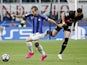 Inter Milan's Henrikh Mkhitaryan in action with AC Milan's Rade Krunic on May 10, 2023