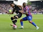 Bournemouth's Lloyd Kelly in action with Crystal Palace's Jordan Ayew on May 13, 2023
