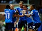 Peterborough United's Joe Ward celebrates scoring their second goal with teammates on May 12, 2023