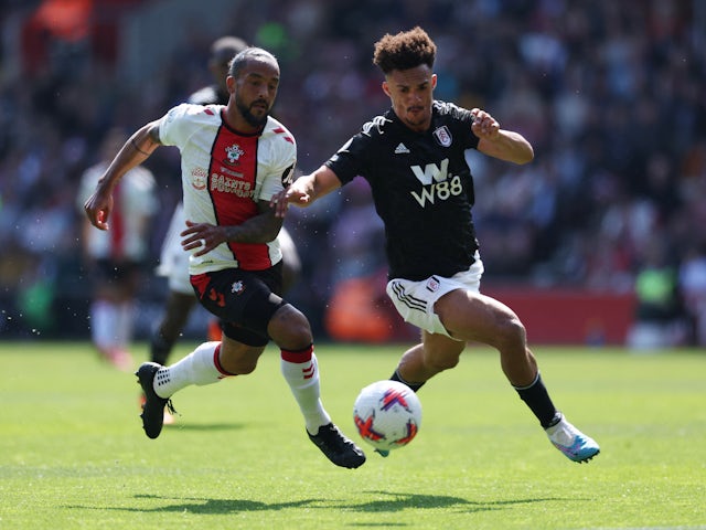Fulham's Antonee Robinson in action with Southampton's Theo Walcott on May 13, 2023