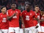 Nottingham Forest's Taiwo Awoniyi celebrates scoring their second goal with Morgan Gibbs-White, Brennan Johnson, Danilo and Moussa Niakhate on May 8, 2023