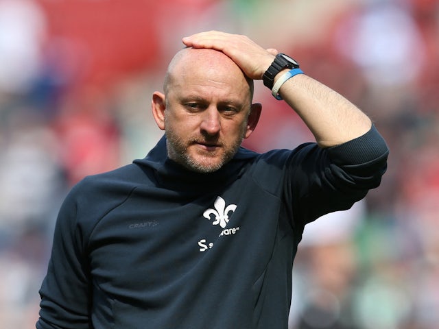 SV Darmstadt 98 coach Torsten Lieberknecht looks dejected after the match on May 14, 2023