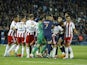 Players clash from both teams before AC Ajaccio's Thomas Mangani and Paris Saint-Germain's (PSG) Achraf Hakimi are both are sent off on May 13, 2023