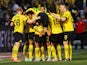 Borussia Dortmund's Sebastien Haller celebrates scoring their third goal with teammates on May 13, 2023