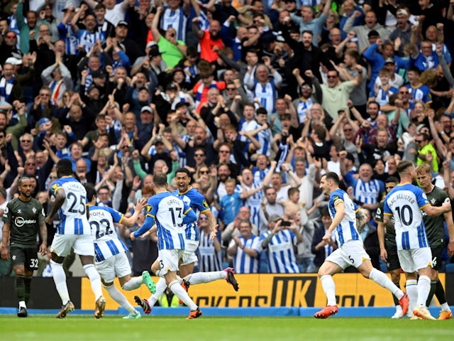 Brighton & Hove Albion's Pascal Gross celebrates scoring their third goal with with teammates on May 21, 2023