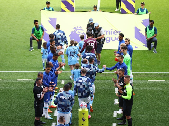 Chelsea players give Manchester City players a guard of honour on May 21, 2023