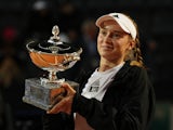 Elena Rybakina poses with the trophy after winning the Italian Open on May 20, 2023