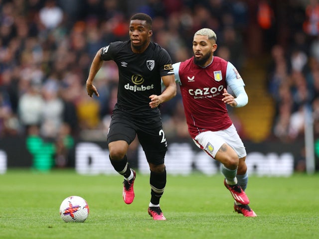 AFC Bournemouth's Hamed Junior Traore in action with Aston Villa's Douglas Luiz on March 18, 2023