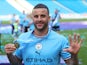 Manchester City's Kyle Walker celebrates after winning the Premier League on May 21, 2023