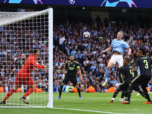 Manchester City's Erling Braut Haaland has his header saved by Real Madrid's Thibaut Courtois on May 17, 2023