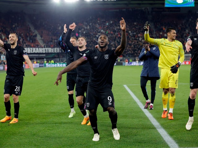 West Ham United's Michail Antonio with teammates celebrate after the match on May 18, 2023