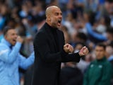 Manchester City manager Pep Guardiola celebrates their first goal scored on May 17, 2023