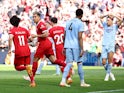 Liverpool's Roberto Firmino celebrates scoring against Aston Villa on May 20, 2023