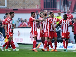 FC Union Berlin's Kevin Behrens celebrates scoring their first goal with teammates on May 13, 2023