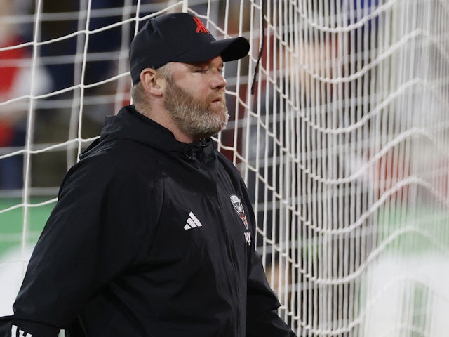 DC United head coach Wayne Rooney walks off the pitch on May 13, 2023