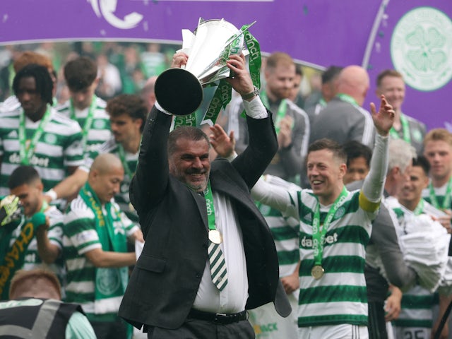 Celtic manager Ange Postecoglou lifts the trophy after winning the Scottish Premiership on May 27, 2023