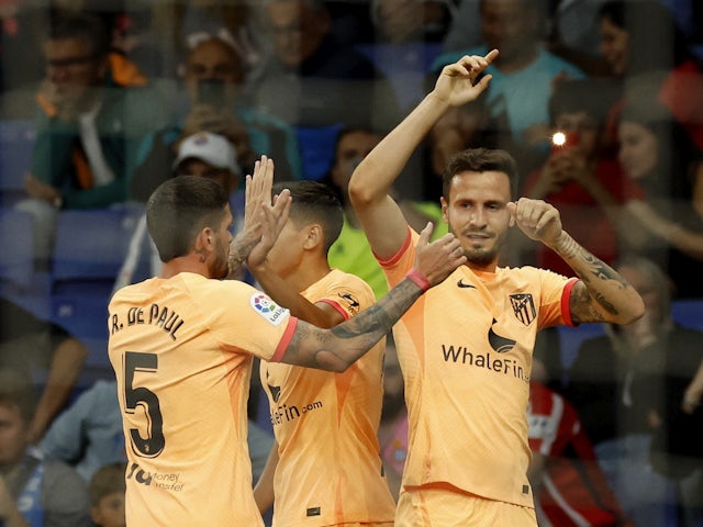 Atletico Madrid's Saul Niguez celebrates scoring their first goal with teammates on May 24, 2023
