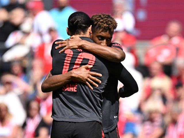 Bayern Munich's Kingsley Coman celebrates scoring their first goal with Leroy Sane on May 27, 2023