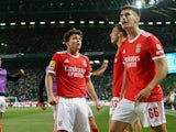 Benfica's Joao Neves celebrates scoring their second goal with Petar Musa and Antonio Silva on May 22, 2023