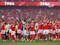 Benfica's Alejandro Grimaldo celebrates with teammates after winning the Primeira Liga on May 27, 2023