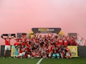 Benfica pose with the trophy after winning the Primeira Liga on May 27, 2023