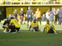 Borussia Dortmund's Youssoufa Moukoko and Anthony Modeste look dejected after the match on May 27, 2023