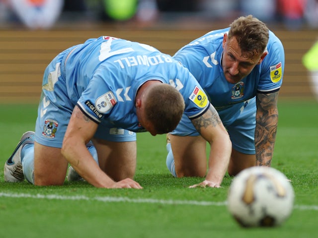 Coventry City's Jake Bidwell and Kyle McFadzean react on May 27, 2023