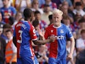 Crystal Palace's Will Hughes celebrates scoring their first goal with Tyrick Mitchell on May 28, 2023