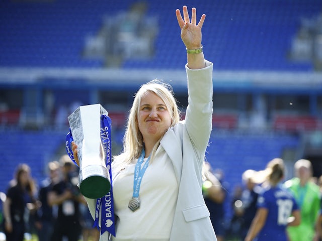 Chelsea Women manager Emma Hayes celebrates with the trophy after winning the Women's Super League on May 27, 2023