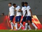 England Under-20s' Dane Scarlett celebrates scoring their first goal with teammates on May 22, 2023